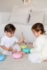 Baby Tambú Csilingelő rózsaszín gyerekhangszer, zenedob, handpan